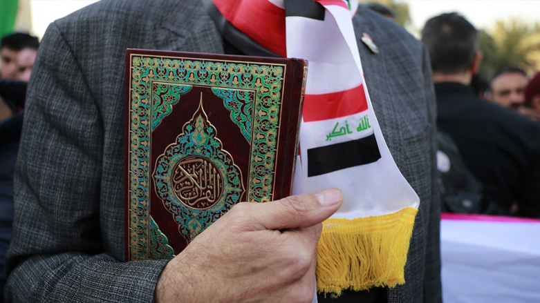 Iraq flag and Quran