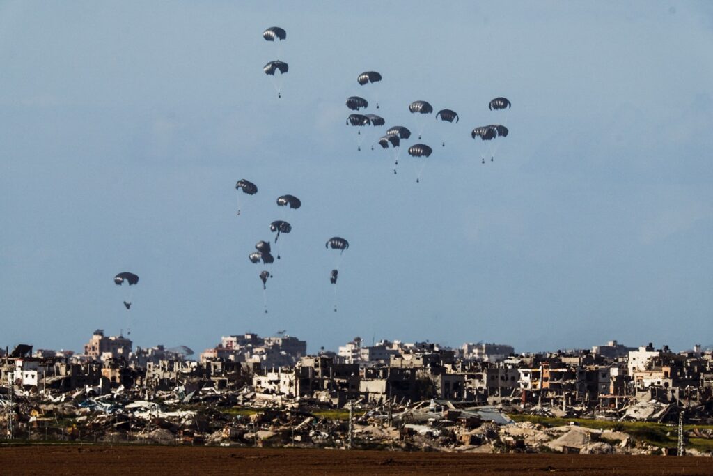 At least 18 Palestinians lost their lives while attempting to retrieve aid packages that were airdropped into the Gaza Strip.