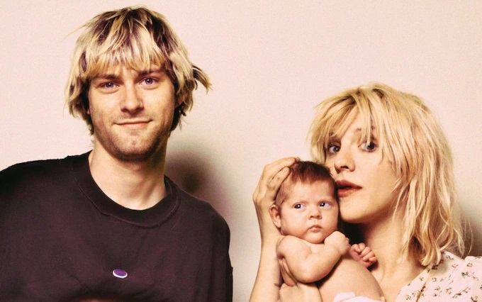 Kurt Cobain with wife Courtney and daughter Frances.
