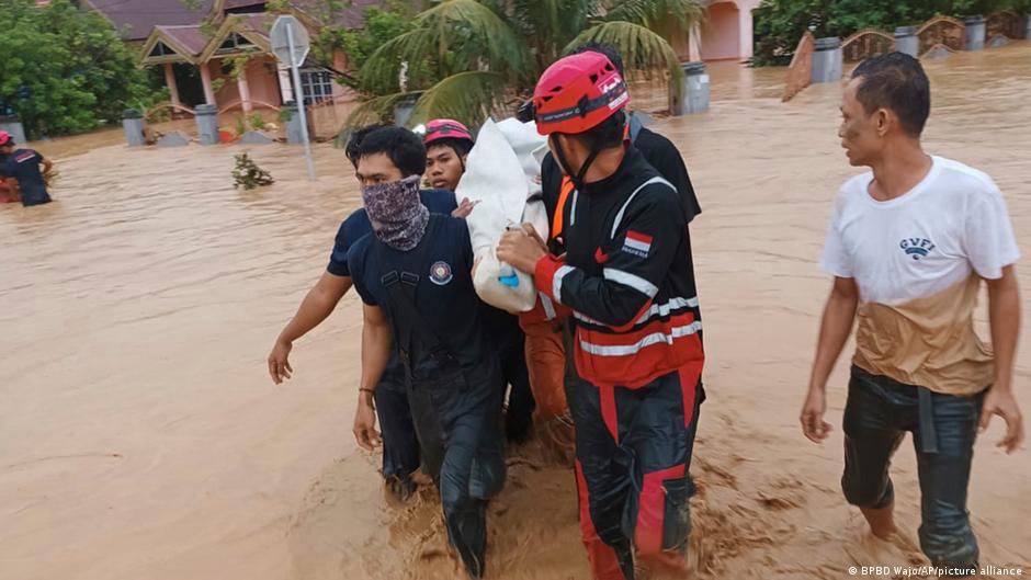 At least 14 people have died in the flash flood and landslide in Sulawesi