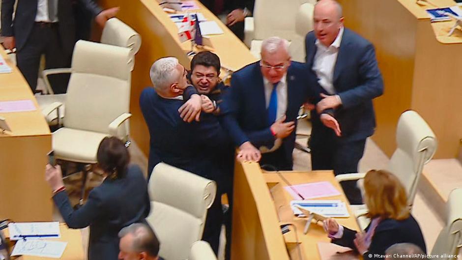 Some lawmakers came to blows during the final debate on the contentious new law
