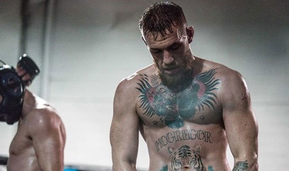Conor McGregor, scratched from his upcoming UFC comeback fight due to injury, vowed Saturday to return to face Michael Chandler.