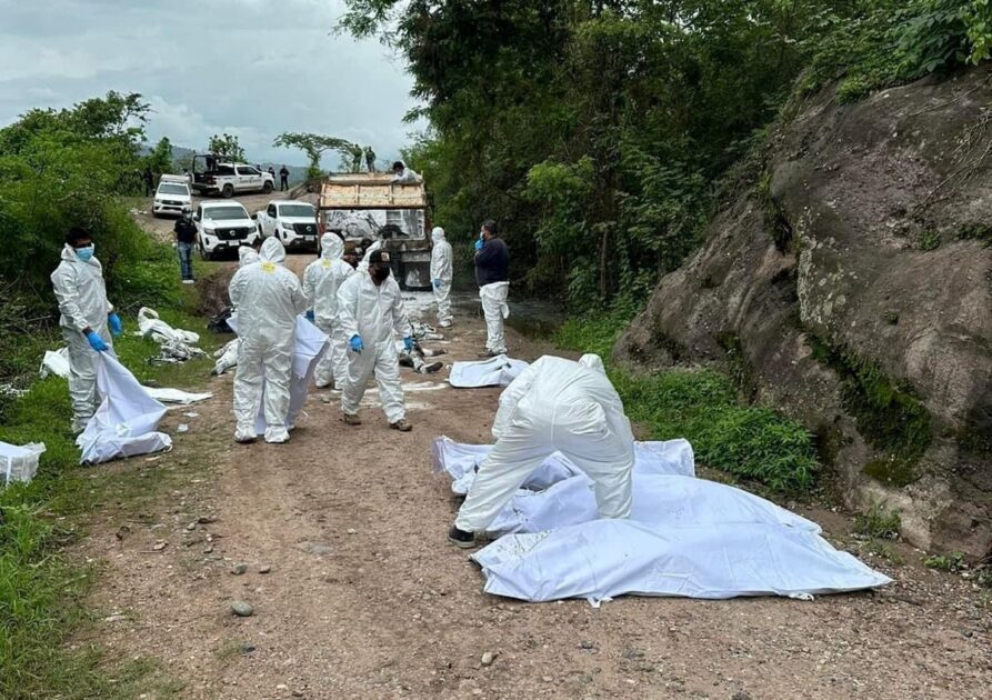 Mexican security officials found the bodies of 19 men piled into the back of a truck, the local prosecutor's office said late on Monday, with the victims allegedly linked to a gunfight between a Guatemalan criminal gang and Mexico's powerful Sinaloa cartel.