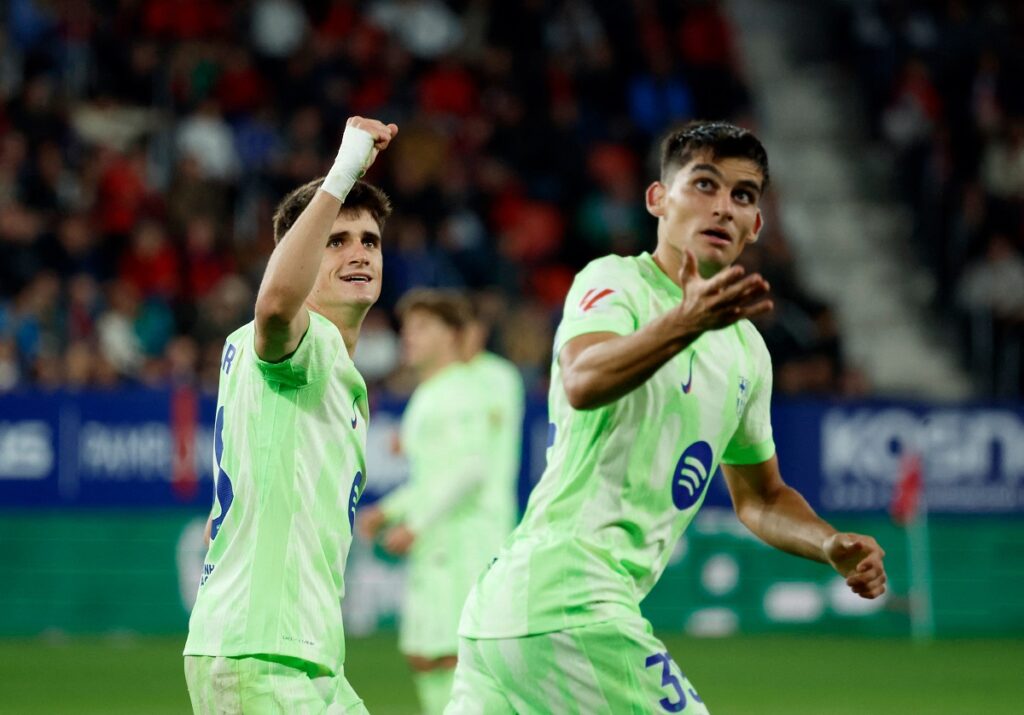 Ante Budimir scored twice to help Osasuna earn a shock 4-2 home win over leaders Barcelona and hand the visitors their first defeat.