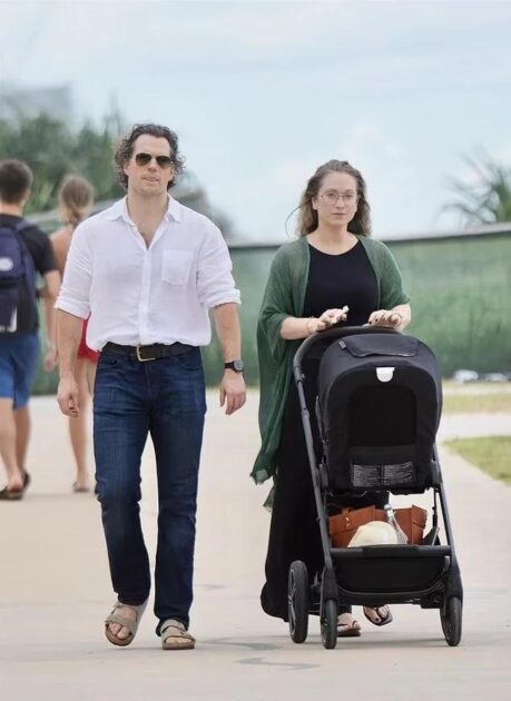 Henry Cavill and his partner, Natalie Viscuso, reportedly welcomed their first child, as the couple was seen in Australia with a stroller.