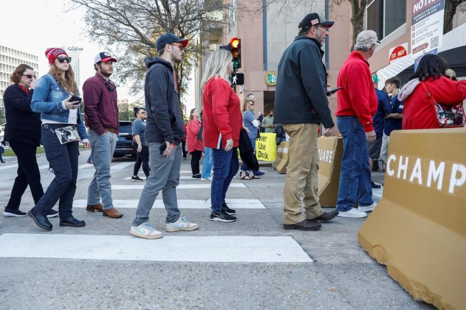 College football's annual Sugar Bowl in New Orleans featured heightened security, a moment of silence and chants of 