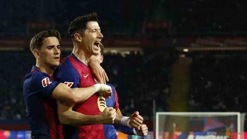 Striker Robert Lewandowski scored a first-half penalty to give Barcelona a hard-fought 1-0 home win over Rayo Vallecano