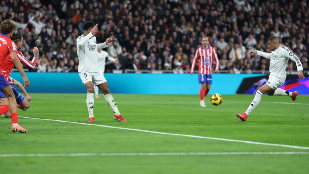 Kylian Mbappe secured Real Madrid a 1-1 draw against rivals Atletico Madrid which kept Los Blancos top of La Liga on Saturday.