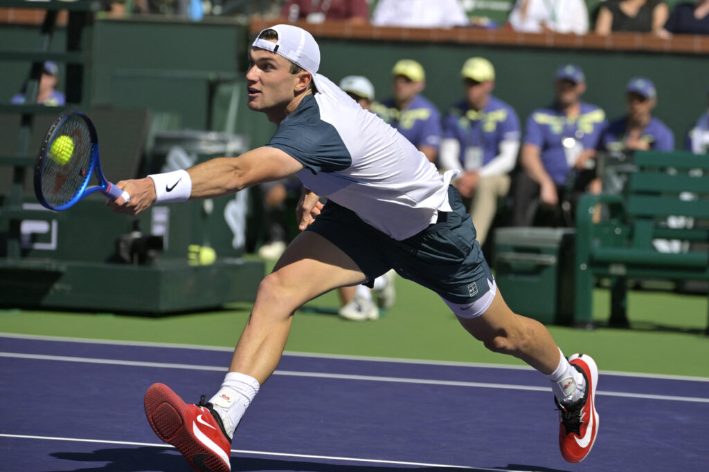 Mar 16, 2025; Indian Wells, CA, USA;  Jack Draper (GBR) hits a shot as he defeated Holger Rune (not pictured) in the menÕs final of the BNP Paribas Open at the Indian Well Tennis Garden. Mandatory Credit: Jayne Kamin-Oncea-Imagn Images