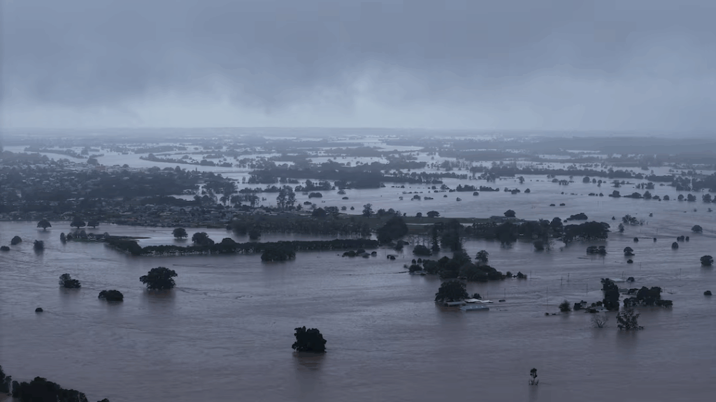 Torrential rain pummelled Australia's southeast on Thursday, triggering flash flooding and forcing officials to issue fresh evacuation orders