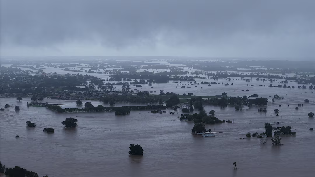 Torrential rain pummelled Australia's southeast on Thursday, triggering flash flooding and forcing officials to issue fresh evacuation orders