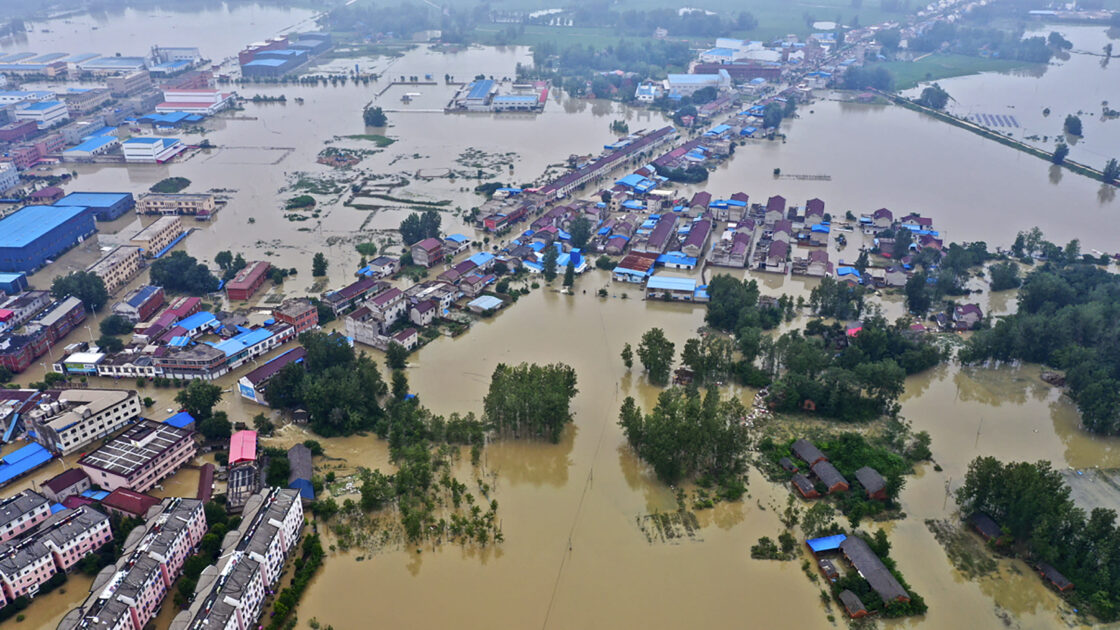 Heavy rain around Beijing and across north and northeast China has killed two and forced thousands to relocate.