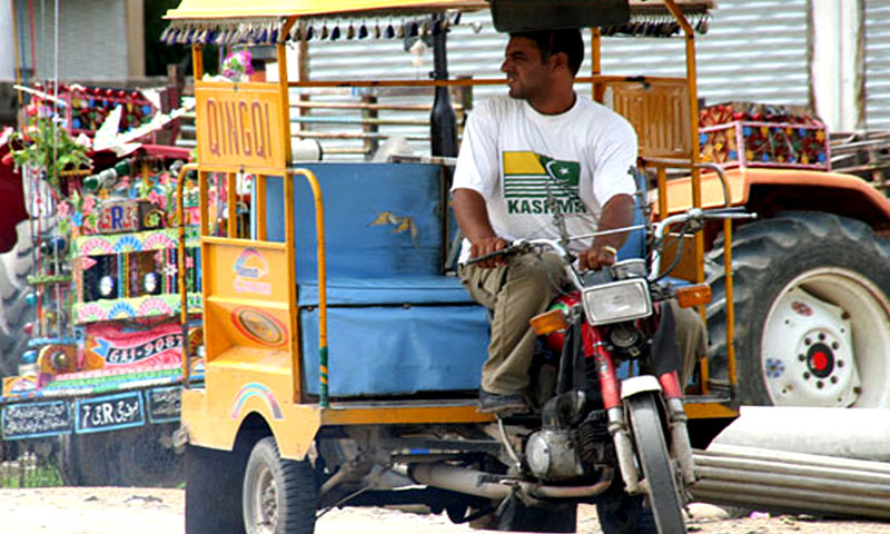 petrol-powered motorcycle rickshaws