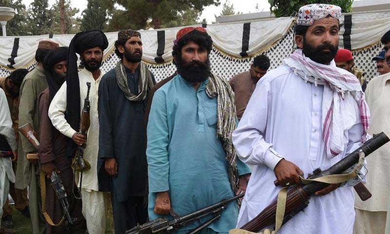 Baloch militants give up weapons